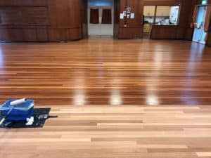 Community Teak Hardwood Hall Floor Being Laquered