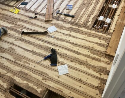Floor repairs including gap filling and floorboard replacements