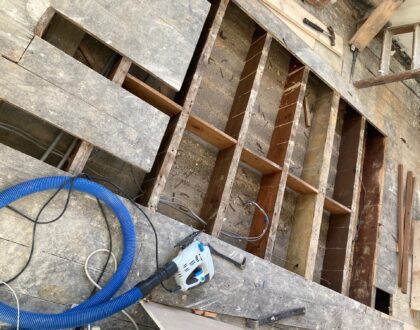 Large missing section in pine floorboards