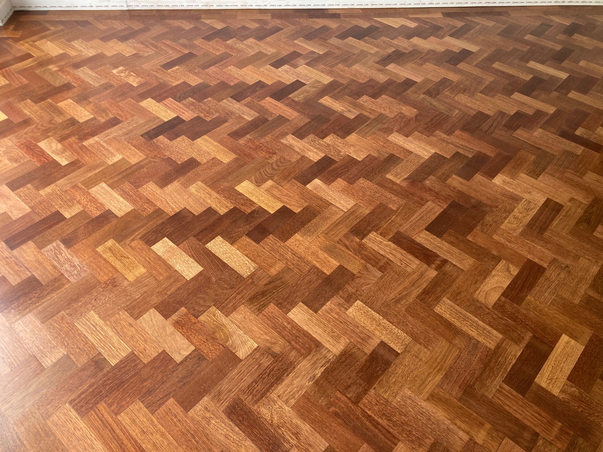 Fresly refinished hardwood parquet floor